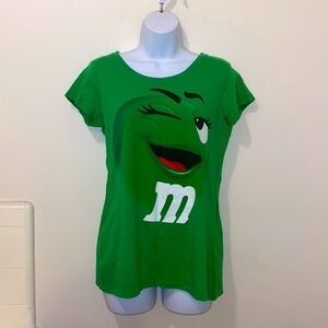 Juniors M&M's Chocolate Candy Ms. Green Character Face Graphic Tee